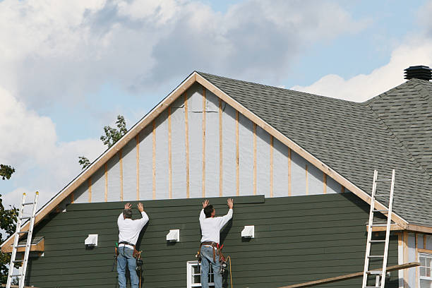 Professional Siding Replacement technician working in Plano, TX